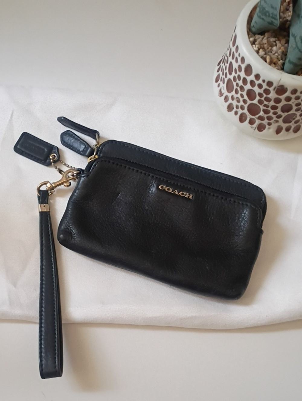 Coach Black Leather Wristlet with Gold Logo and black hangtag